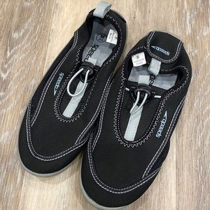 Never worn boys size 2/3 black Speedo water shoes